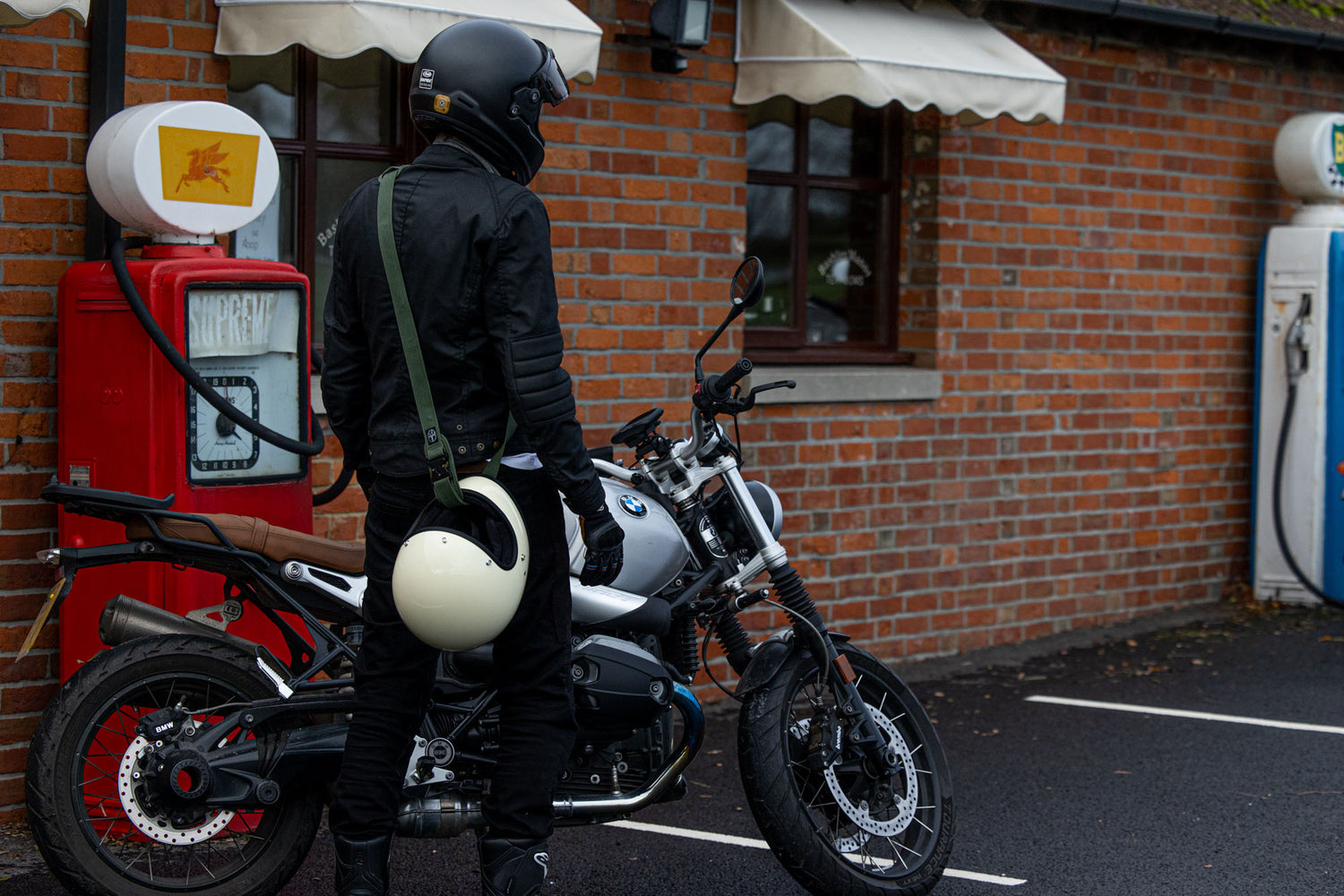 carry helmet on motorcycle Wentworth Sling Helmet Carry Strap Olive – The Occasional Rider